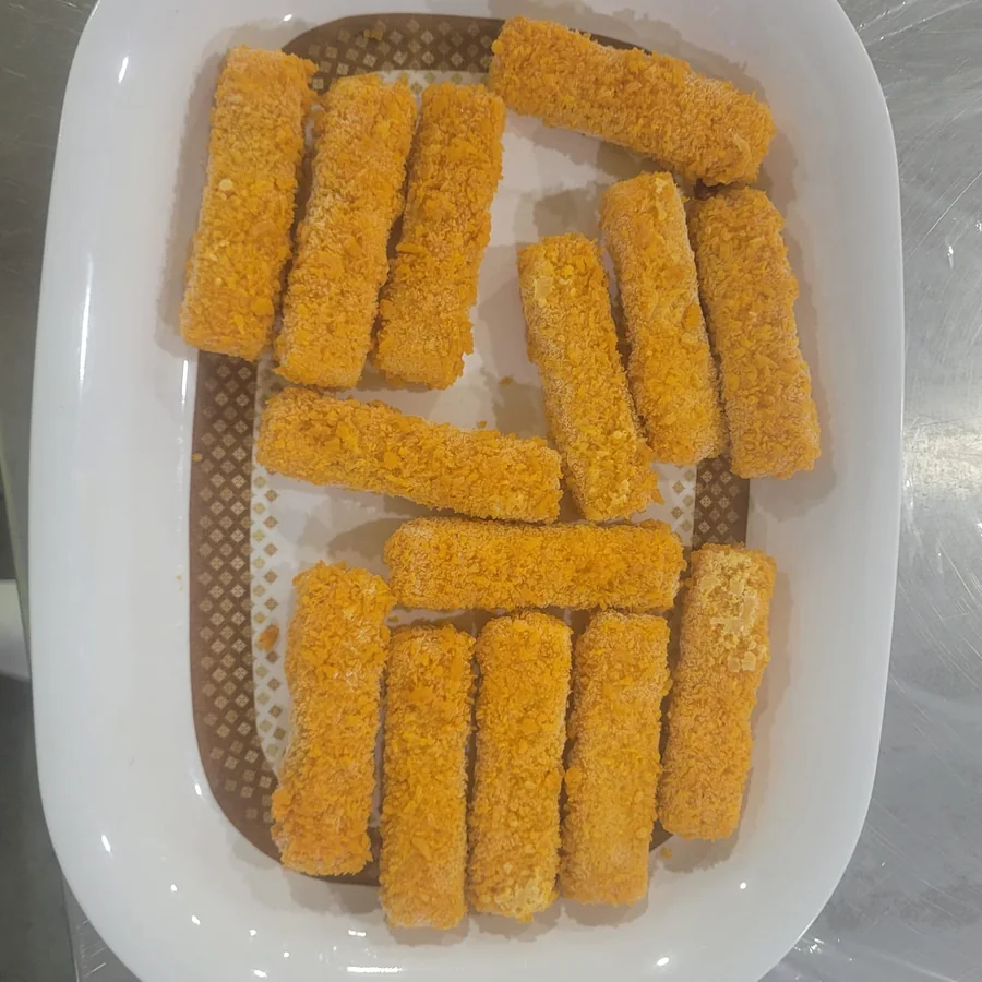 Crumb-coated fingers ready for the fryer